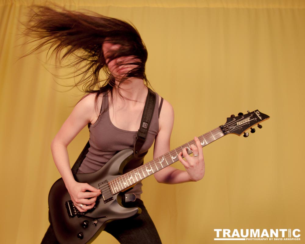 I saw an amazing picture on a web site of this female guitarist.  She was beautiful.  After a bit of searching, I was able to contact her and we did this shoot together.